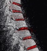 3D render of a spine with disintegration effect